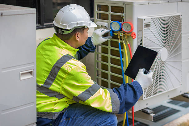 Professional Air Duct Cleaning technician working in Bloomingdale, NJ